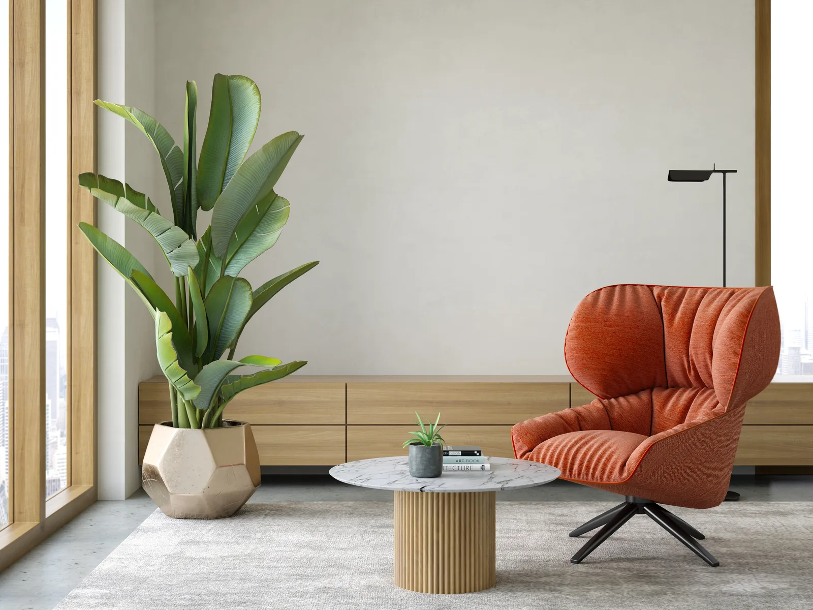 A quiet corner with an orange armchair and a plant
