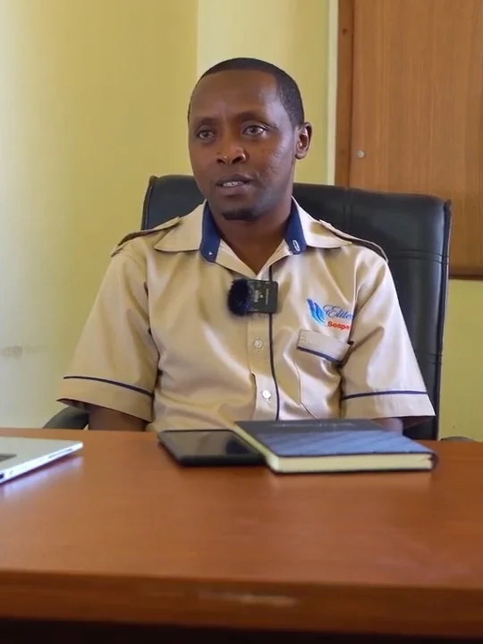 Sospeter Kung'u at his desk at Eliteways